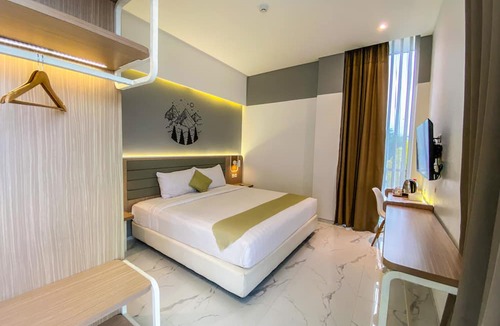 Hargomulyo Hotel | Facade Hotel by Azana