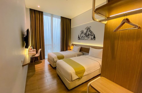 Hargomulyo Hotel | Facade Hotel by Azana