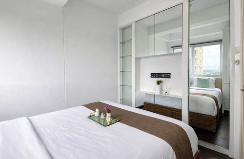 Cipulir Apartment | Lavish White 1Br With Working Room At Pakubuwono Terrace Apartment
