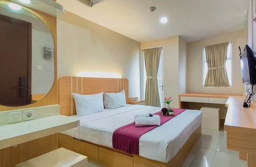 Surabaya Apartment | Comfy Modern Look Studio Room At Apartment Grand Dharmahusada Lagoon