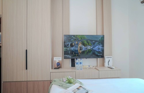 Semanggi Apartment | Comfy White Studio At Ciputra World 2 Apartment