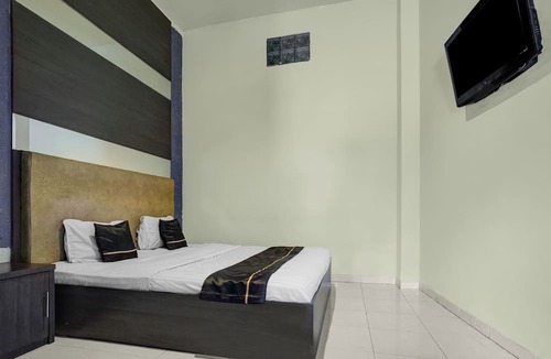 Palembang Hotel | Hotel O near Universitas Widya Dharma