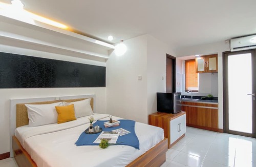 Kebagusan Apartment | Wooden Touch Studio At Kebagusan City Apartment