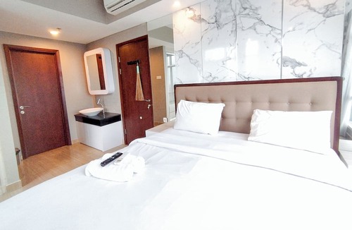 Surabaya Apartment | Spacious 2Br With Extra Room At Grand Sungkono Lagoon Apartment