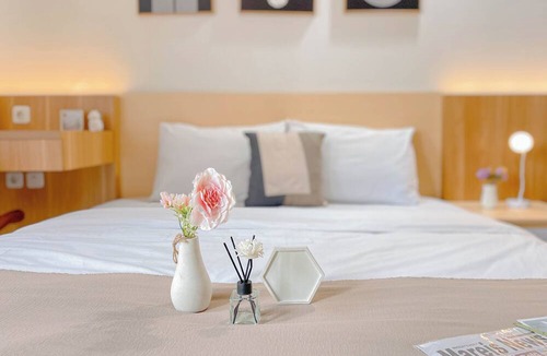 Depok Apartment | Cozy Living Studio at Evenciio Margonda Apartment
