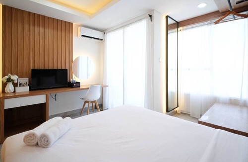 Suko Manunggal Apartment | New And Cozy Studio At 88 Avenue Apartment