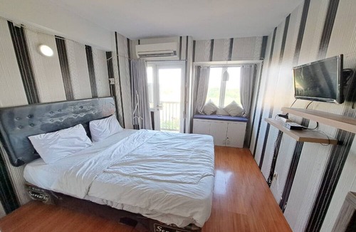 Karawang Timur Hotel | OYO Life 93106 Apartement Grand Sentraland By Andi