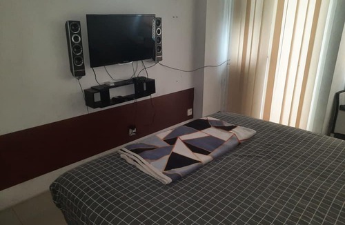 Karawang Hotel | OYO Life 93139 Apartemen Grand Sentraland By Evi