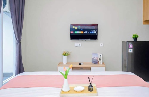 Kedungmanggu Apartment | Restful Studio With City View At Royal Sentul Park Apartment