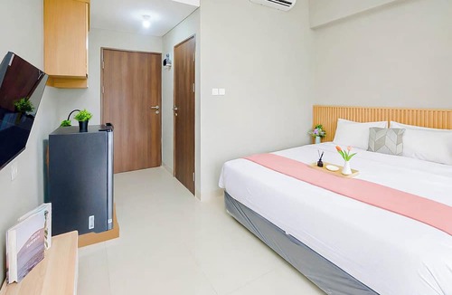 Kedungmanggu Apartment | Restful Studio With City View At Royal Sentul Park Apartment