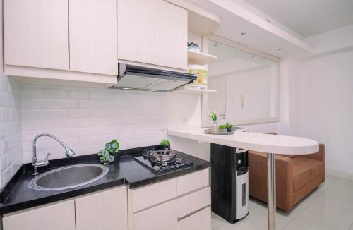 Jatinegara Apartment | Exquisite 2BR Bassura City Apartment near Shopping Mall By Travelio