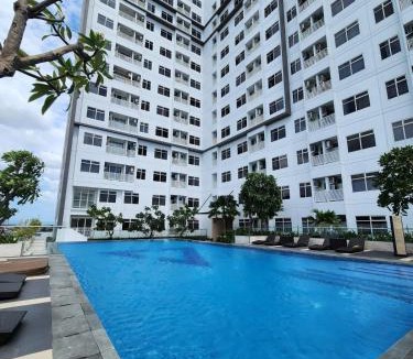 Wonokromo Apartment | Apartment with Living Room and Pool View