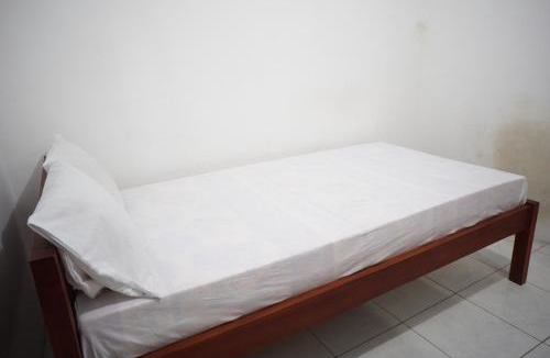 Dinoyo Hotel | OYO 95348 Kost Baituna Syariah