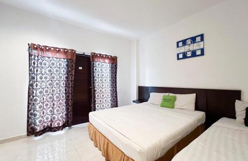 Raya Kuta Hotel | Urbanview Hotel Grand Pudjawan near Kuta Beach