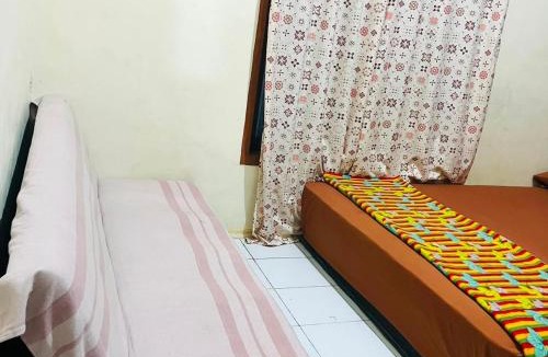 Padang House | Rabani House - 15 Min to Mentawai Fast Ferry - Local Stay & Sumatra Experiences