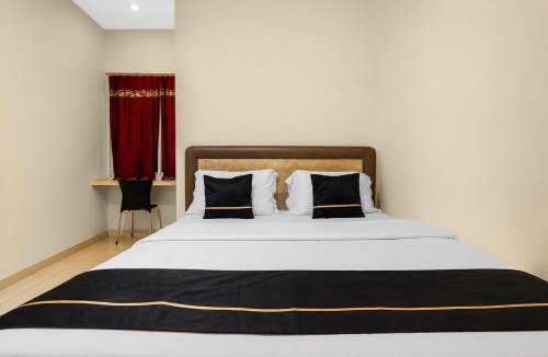 Palembang Hotel | Hotel O near Social Market formerly Kosta Living