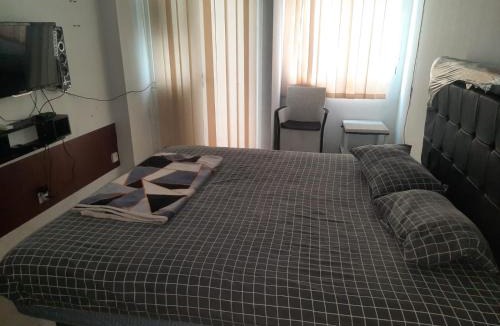 Karawang Hotel | Hotel O Apartemen Grand Sentraland by Mira