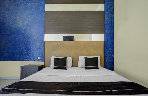 Palembang Hotel | Hotel O near Universitas Widya Dharma formerly Nugraha Residence