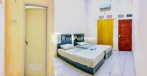 Cikokol Hotel | PSM Syariah Guest House RedPartner