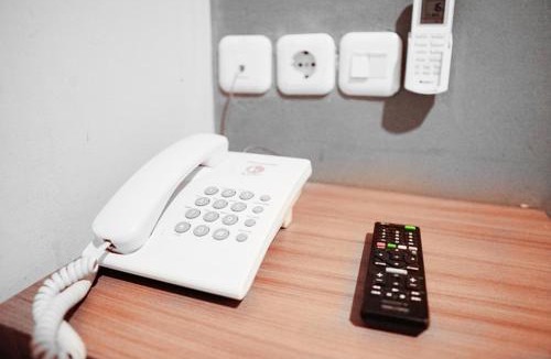 Darmo Hotel | Audah Syariah Residence Mitra RedDoorz