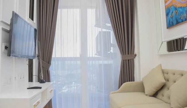Modern And Comfy 2Br At Menteng Park Apartment