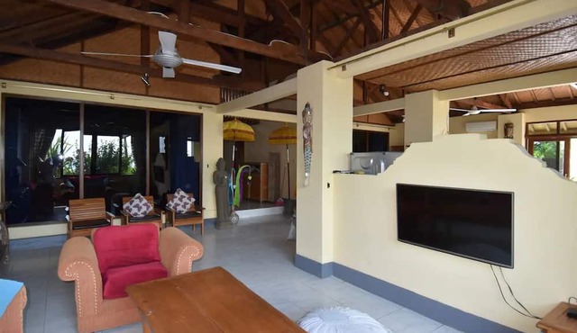Beachfront villa with private pool, garden and terrace
