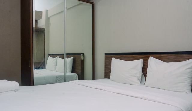 Cozy and Minimalist Kebagusan City 2BR Apartment in Jakarta