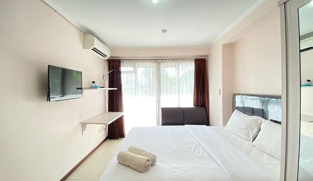 Simply Bright Studio Room at Gateway Pasteur Apartment