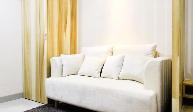Modern Style The Oasis Studio Apartment with Comfortable Sofa