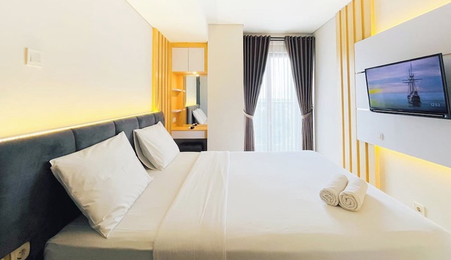 Neat Warm Wooden Tone 1Br At Patraland Amarta Apartment