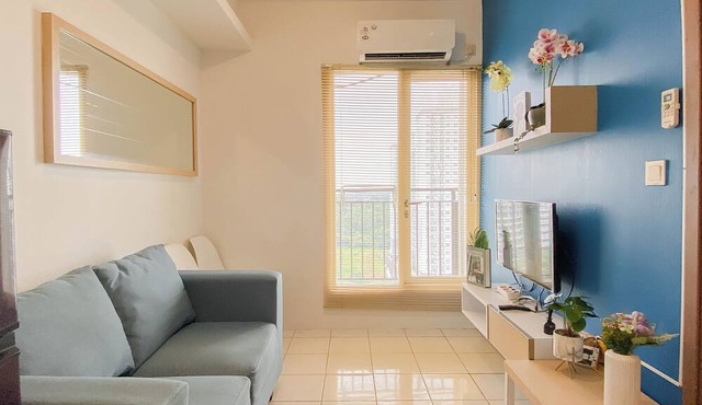 Cozy With Blue Accent 2Br At Podomoro Golf View Apartment in Gunung Putri