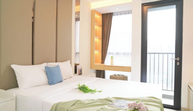 Modern Brown Toned Studio At Ciputra World 2 Apartment