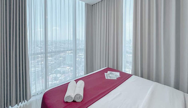 Combined Grey Toned 2Br Apartment At The City Square Surabaya
