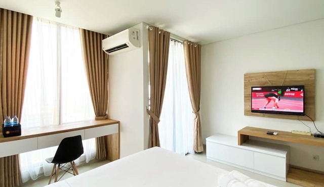 Wooden Touch Studio At Lrt City Bekasi Apartment in Bekasi