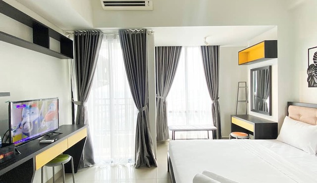 Monochromatic Studio At Lrt City Bekasi Apartment in Bekasi