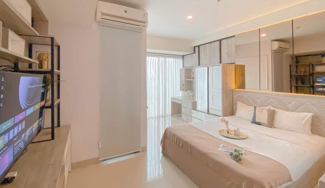 Homey and Restful Studio Grand Kamala Lagoon Apartment