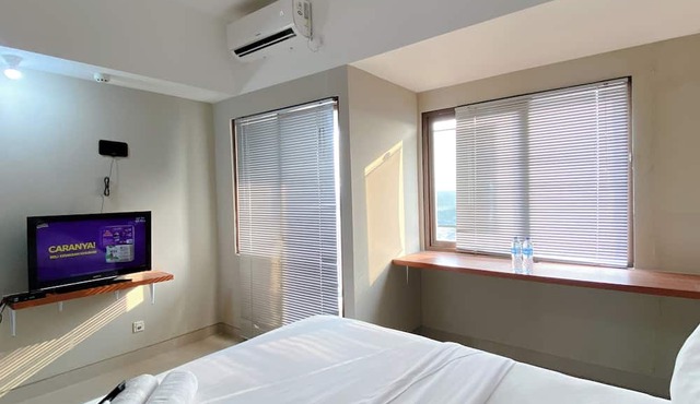 Homey and Minimalist Studio LRT City Jatibening Apartment in Bekasi