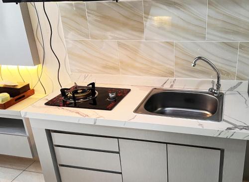 Apartemen Springlake Summarecon by Titik Singgah in Rawabugel
